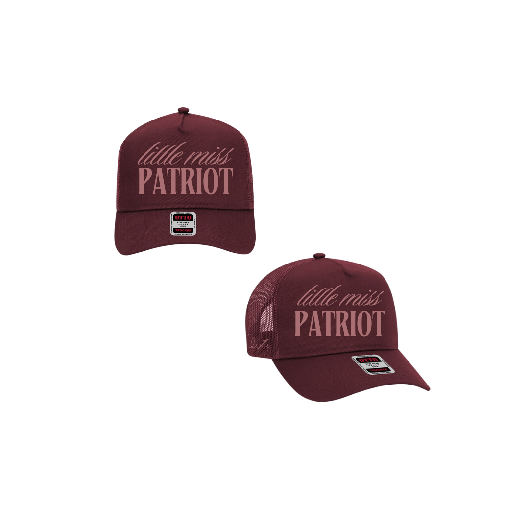 Maroon hat with mauve text that reads "little miss patriot". Lexie's signature is embroidered on the side.