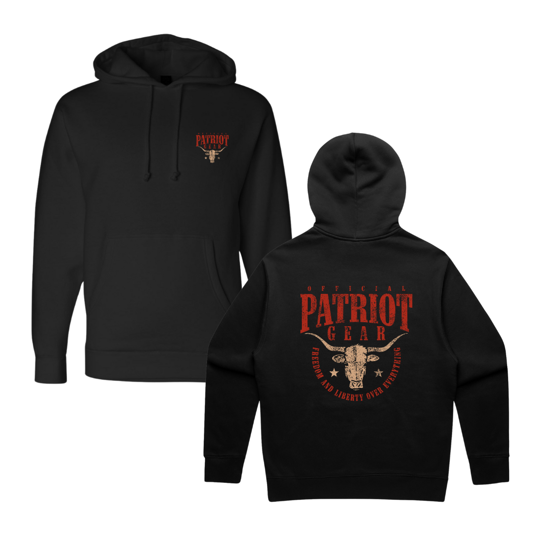 This photo features both the front and back of the hoodie. The front has a small tan steer skull on the front left chest with the words "Official Patriot Gear" in red ink.
The back features the words OFFICIAL PATRIOT GEAR in red above a an steer skull with stars on either side. Underneath, in an upside down arch, are the words freedom and liberty over everything (in red ink).