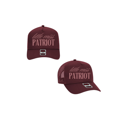 Maroon hat with mauve text that reads "little miss patriot". Lexie's signature is embroidered on the side. 