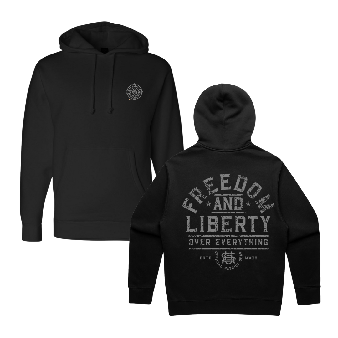 Front and Back view of a black hoodie. 
A small circular logo on the left chest on the front, features a USA design (the letters U, S, & A intertwined) and Official Patriot Gear around the outside. The Back has large grey distressed letters "Freedom and Liberty over Everything" The word freedom is arched across the back. and the other words are nested underneath FREEDOM. The bottom has a USA logo and "official patriot gear" as well as the roman numerals for 2020 (when OPG was founded). 