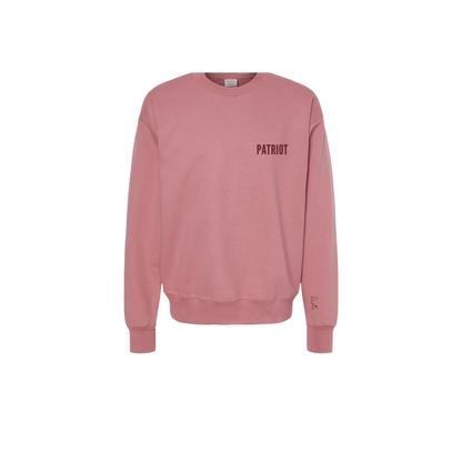 Pink crewneck with magenta patriot logo on the left chest. Lexie's signature is embroidered on the sleeve. 