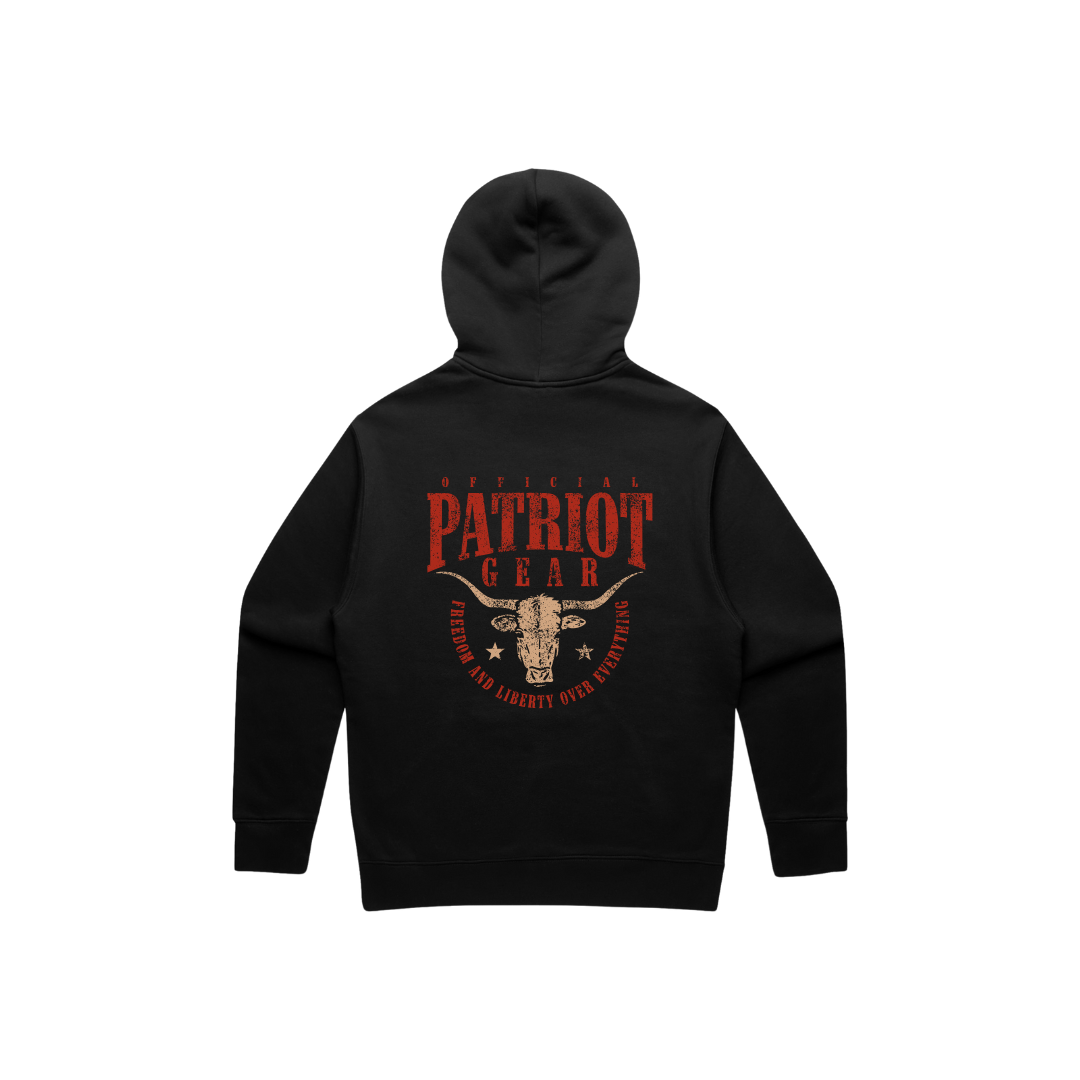 The back of a black hooded sweatshirt. Printed on the back are the words OFFICIAL PATRIOT GEAR in red above a an steer skull with stars on either side. Underneath, in an upside down arch, are the words freedom and liberty over everything (in red ink). 