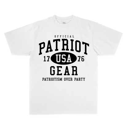 White oversized T-shirt from Official Patriot Gear, featuring a bold white collegiate-style graphic on the front. The design includes "OFFICIAL PATRIOT GEAR" in large black letters, with "USA" inside an oval between the numbers "17" and "76." Below, the slogan "PATRIOTISM OVER PARTY" is displayed in capital letters. The shirt has a classic crew neck and short sleeves, with a relaxed, athletic fit. 